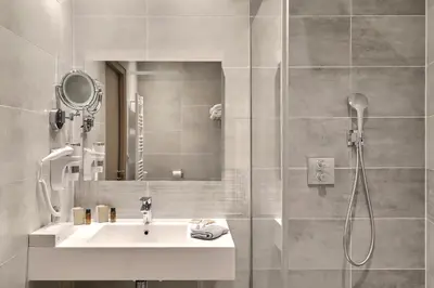 Salle de bains dans l'établissement Grand Hôtel des Bains SPA