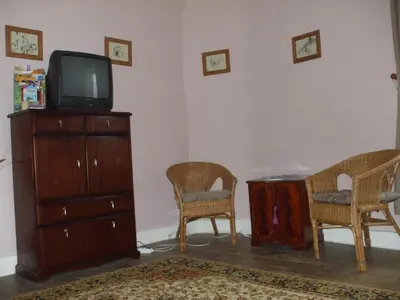 Télévision ou salle de divertissement dans l'établissement Bed and Breakfast Dunroamin