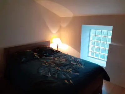 Un ou plusieurs lits dans un hébergement de l'établissement Proche Futuroscope - Maison de campagne - La petite Lucie