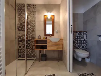 Salle de bains dans l'établissement Les Cuves - Saintes