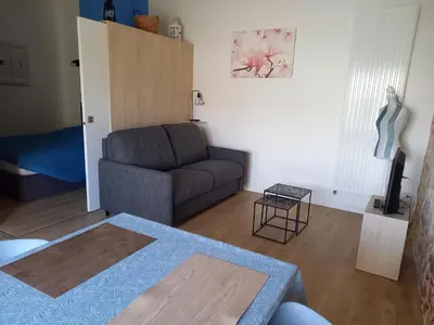 Coin salon dans l'établissement Gîte la petite maison