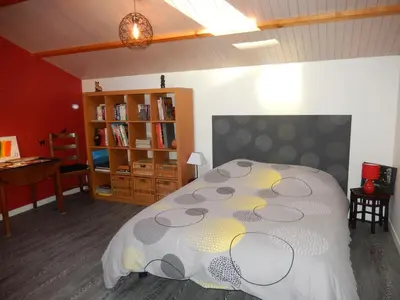 Un ou plusieurs lits dans un hébergement de l'établissement Studio Appart' Les jards