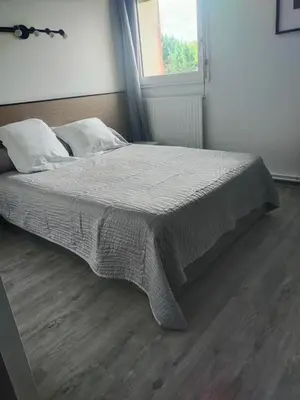Un ou plusieurs lits dans un hébergement de l'établissement Hôtel Bon Repos
