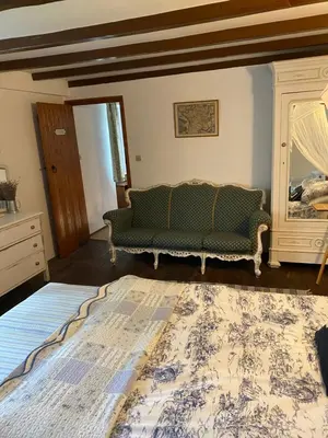 Un ou plusieurs lits dans un hébergement de l'établissement Maison L’allee