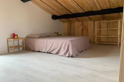 Un ou plusieurs lits dans un hébergement de l'établissement Chalet Nature & chiens de traîneaux