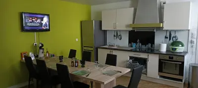 Cuisine ou kitchenette dans l'établissement Gîte de La Bicyclette