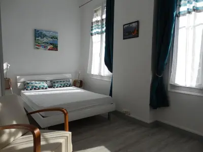 Un ou plusieurs lits dans un hébergement de l'établissement Appartement T2 ou T1 côté cour/jardin avec garage