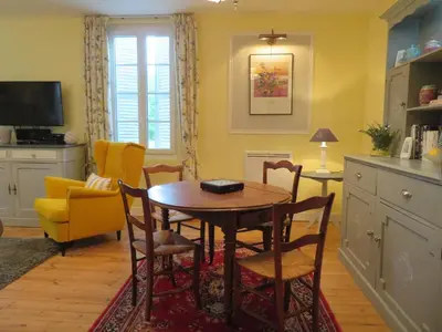 Télévision ou salle de divertissement dans l'établissement La Maison de Riviere