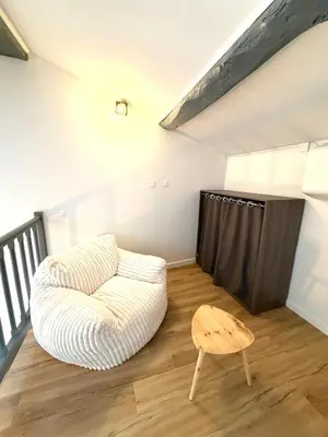Coin salon dans l'établissement Petite maison tout confort