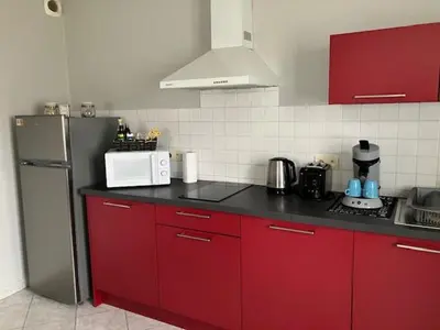 Cuisine ou kitchenette dans l'établissement Le 32