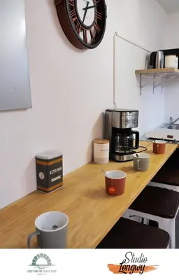 Cuisine ou kitchenette dans l'établissement Locations du Grand Pont - Appart hôtel Poitiers - Futuroscope