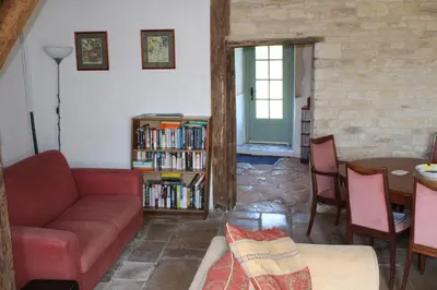Coin salon dans l'établissement La Ferme de l'Eglise