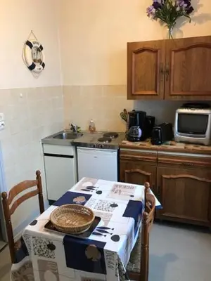 Cuisine ou kitchenette dans l'établissement Ocean