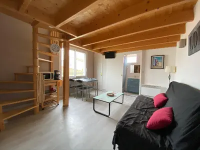 Coin salon dans l'établissement CENTRE CHATELAILLON GRAND LOFT ** 100m DE LA PLAGE