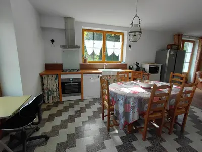 Cuisine ou kitchenette dans l'établissement LA CLAIRIERE AU BOIS