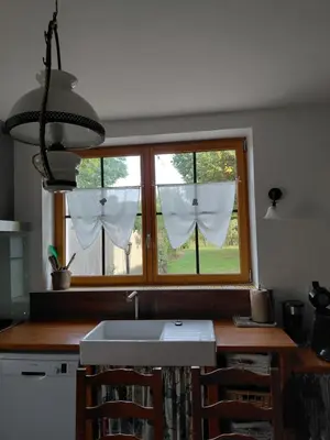 Cuisine ou kitchenette dans l'établissement LA CLAIRIERE AU BOIS
