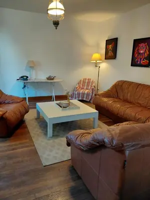 Coin salon dans l'établissement LA CLAIRIERE AU BOIS