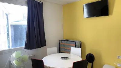 Télévision ou salle de divertissement dans l'établissement Appartement Futuroscope-E'
