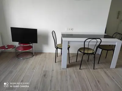 Télévision ou salle de divertissement dans l'établissement Appartement Futuroscope-E'