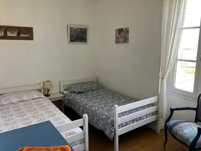 Un ou plusieurs lits dans un hébergement de l'établissement Gîte des Roses