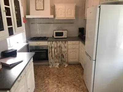 Cuisine ou kitchenette dans l'établissement Gîte des Roses