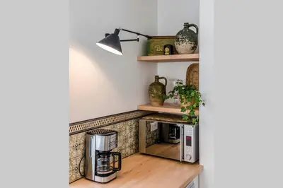 Cuisine ou kitchenette dans l'établissement L'Appart