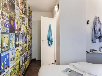 Un ou plusieurs lits dans un hébergement de l'établissement hotelF1 Poitiers Nord Futuroscope