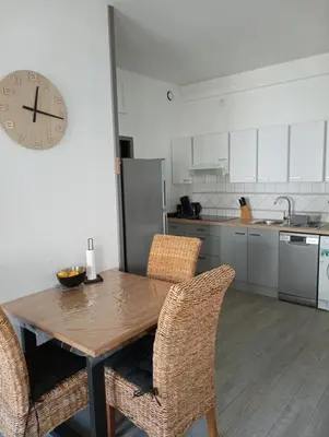 Cuisine ou kitchenette dans l'établissement Nid Douillet