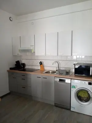 Cuisine ou kitchenette dans l'établissement Nid Douillet