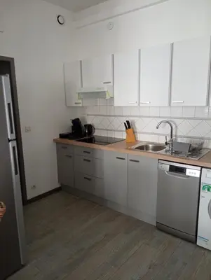 Cuisine ou kitchenette dans l'établissement Nid Douillet