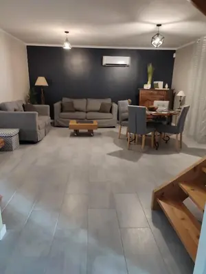 Coin salon dans l'établissement GITE DE MONTRANCON