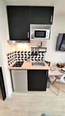 Cuisine ou kitchenette dans l'établissement Home&Work 101 - HYPERCENTRE - Parking à proximité