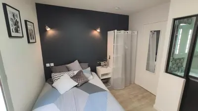 Un ou plusieurs lits dans un hébergement de l'établissement Home&Work 201 - HYPERCENTRE - fibre et parking a proximité