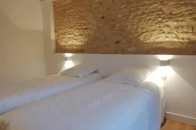 Un ou plusieurs lits dans un hébergement de l'établissement Maison Terracotta, le calme aux portes de Poitiers
