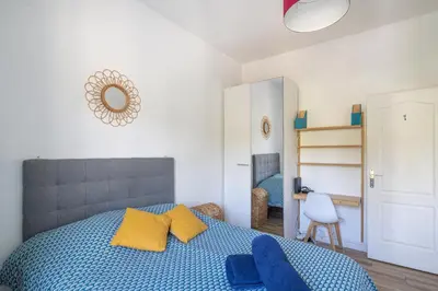 Un ou plusieurs lits dans un hébergement de l'établissement Superbe appartement dans le centre historique