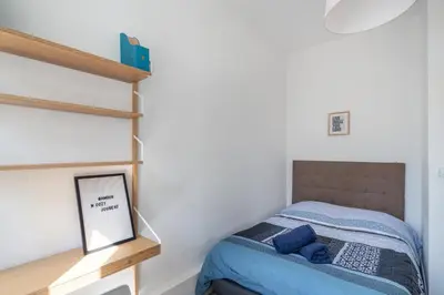 Un ou plusieurs lits dans un hébergement de l'établissement Superbe appartement dans le centre historique