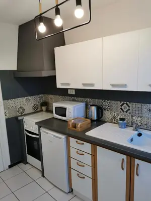 Cuisine ou kitchenette dans l'établissement Studio COSY Tout Confort Proche Hyper-Centre