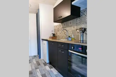 Cuisine ou kitchenette dans l'établissement Studio RELAX Tout Confort Proche Hyper-Centre