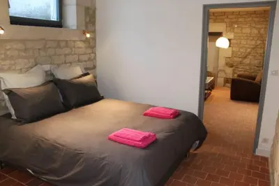 Un ou plusieurs lits dans un hébergement de l'établissement Château des Loups - Les Cèdres Bleus