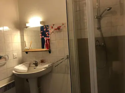 Salle de bains dans l'établissement LES APPART's DES THERMES