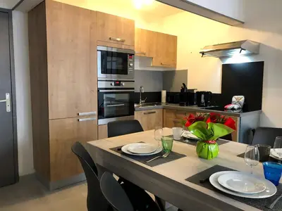 Cuisine ou kitchenette dans l'établissement LES APPART's DES THERMES