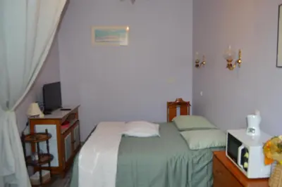 Un ou plusieurs lits dans un hébergement de l'établissement Chambre Charentaise