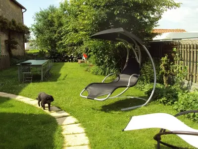 Jardin de l'établissement Maison rénovée avec jardin, SPA, vélos près des commerces - Animaux acceptés - FR-1-426-291