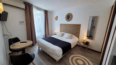 Un ou plusieurs lits dans un hébergement de l'établissement Le Relais du Valois, Cognac Centre