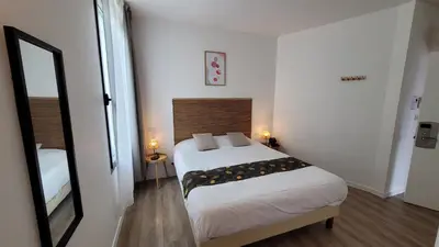 Un ou plusieurs lits dans un hébergement de l'établissement Le Relais du Valois, Cognac Centre