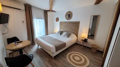 Un ou plusieurs lits dans un hébergement de l'établissement Le Relais du Valois, Cognac Centre