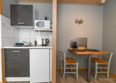 Cuisine ou kitchenette dans l'établissement CASA UPUPA