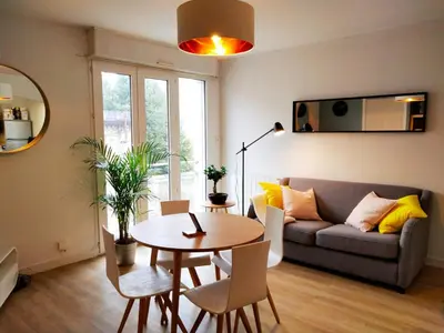Coin salon dans l'établissement Le 14 - Style Scandinave with Parking