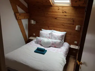 Un ou plusieurs lits dans un hébergement de l'établissement Gîte 4 personnes situé aux portes du Périgord