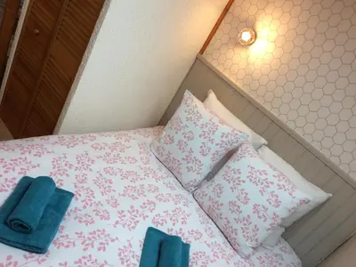 Un ou plusieurs lits dans un hébergement de l'établissement Gîte 5/6 personnes aux portes du Périgord
